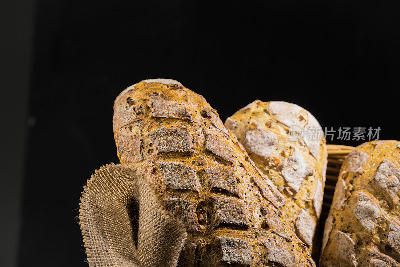 Freshly baked bread on wooden table